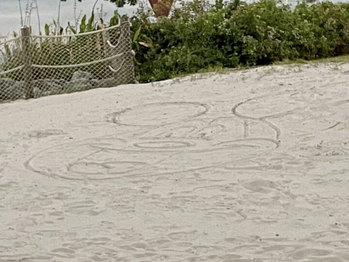 mickey drawn in the sand
